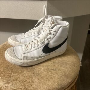 Nike high tops! 
Size 7 
White and black 
Casual sneakers